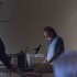 Hollis Frampton, <em>A LECTURE</em>, October 30, 1968, performed on February 11, 2014 by Martin Rumsby at the Adam Art Gallery. Script, 16mm projector, red filter, pipe cleaner. Courtesy of the Estate of Hollis Frampton. Photo: Shaun Waugh.