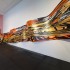 Judy Millar, installation view of <em>Space Work 7</em>, 2014. Wood, paint, digital print, 11.1 x 4.3 meters. Courtesy of the artist, Gow Langsford, Auckland and the Adam Art Gallery. Photo: Shaun Waugh.
