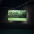 Installation view at the Adam Art Gallery, Shannon Te Ao, <em>Follow the Party of the Whale</em>, 2013, two-channel video, sound, colour, 12:51mins, 2:49mins (cinematography by Iain Frengley) © Shannon Te Ao (photo: Shaun Waugh)