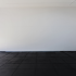 Installation view of Julian Dashper, <em>Untitled (Black: for Fred Sandback, 2001–08)</em> 2016, editions #2–10, black coloured pencil on wall, and <em>Untitled (Blue: for Fred Sandback, 2001–08)</em> 2016, editions #2–10, blue coloured pencil on wall. Courtesy of the Estate of Julian Daspher and Michael Lett, Auckland. In the exhibition <em>Inhabiting Space</em> at the Adam Art Gallery Te Pātaka Toi, Victoria University of Wellington (photo: Shaun Waugh) 