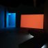 Installation view, Juliet Carpenter, <em>Summer of Supine</em>, 2015, single channel video projection, coloured lighting, courtesy of the artist. In the exhibition <em>Inhabiting Space</em> at the Adam Art Gallery Te Pātaka Toi, Victoria University of Wellington (photo: Shaun Waugh) 